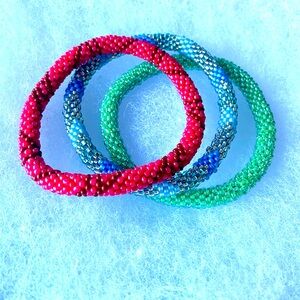 NWOT Tags. Glass bead bracelets.